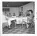 MAG080 - Christmas 1961, Family eating on Ping Pong Table, Olympic St Home Basement